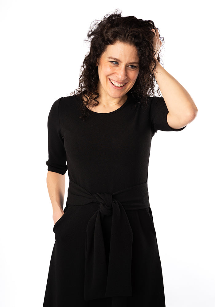 Third angle of Uma Black Textured Crepe Midi Dress