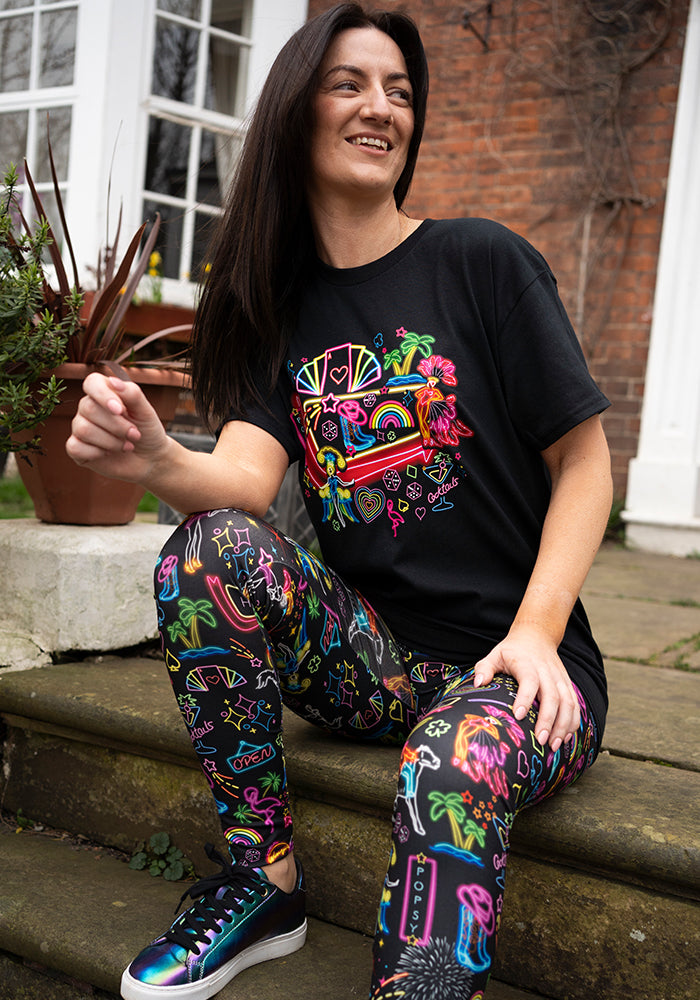 Fourth angle of Vegas Graphic Print T-Shirt, a black tee with a neon Vegas inspired graphic.