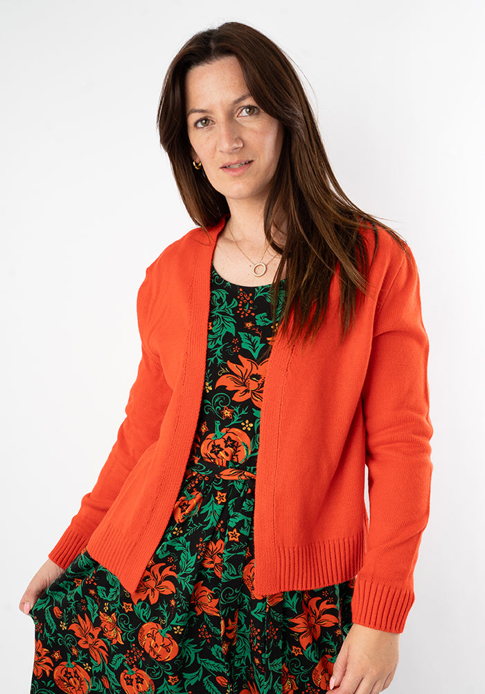 Front view of Warm Orange Ribbed Cuff Cardigan