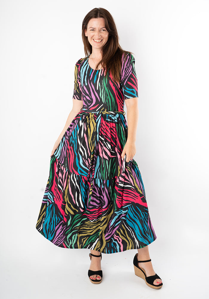Third angle of Zena Bright Animal Print Tiered Hem Midaxi Dress
