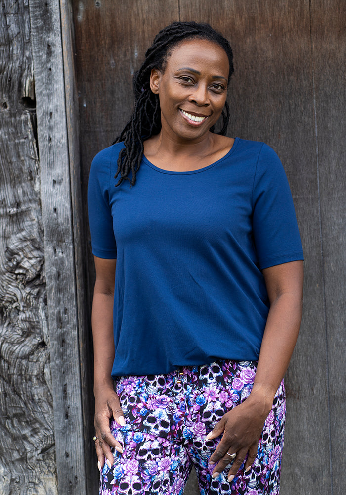 Front view of Zola Solid Navy Cotton Bubble Hem Top
