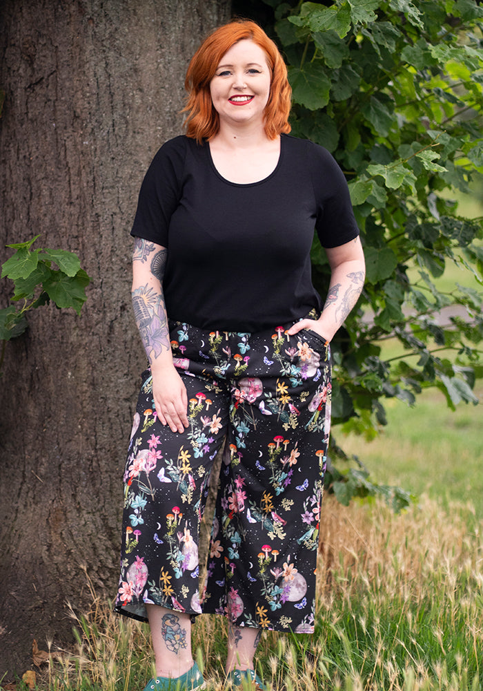 Front view of Zola Solid Black Cotton Bubble Hem Top