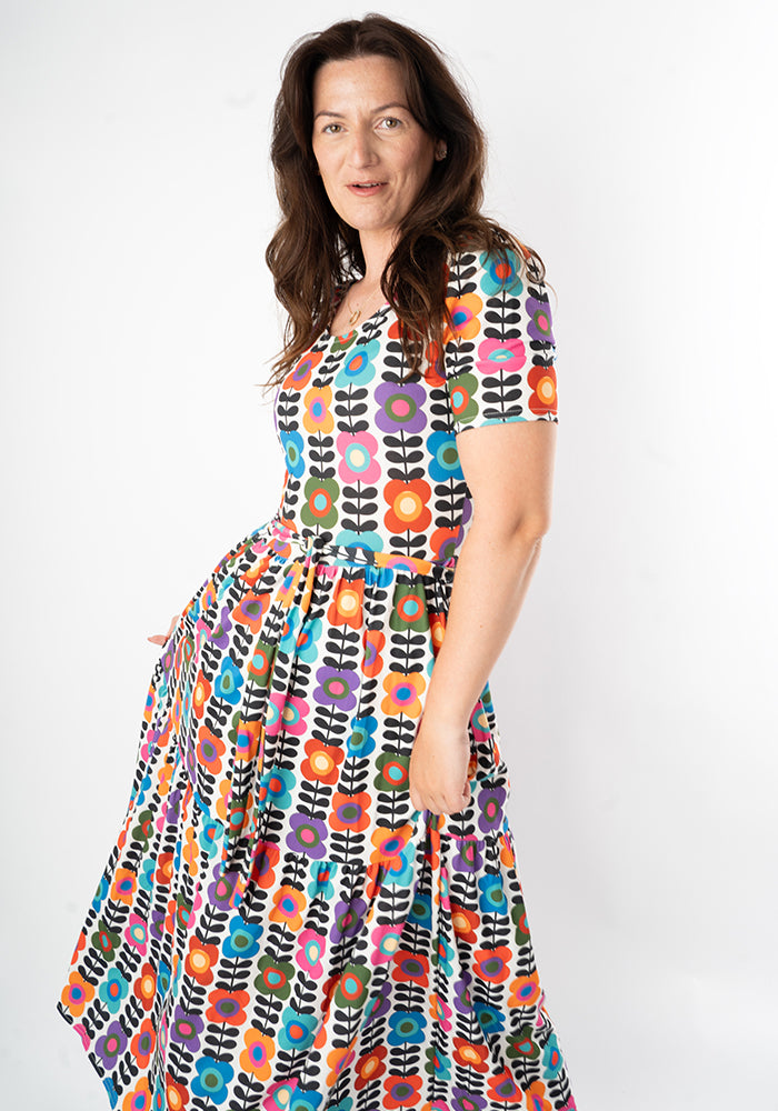 Woman wearing a colourful floral dress