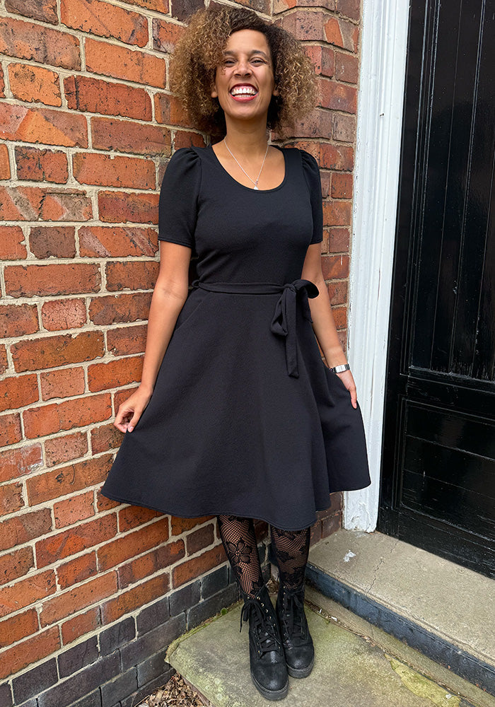 Front view of Becca Black Textured Crepe Dress