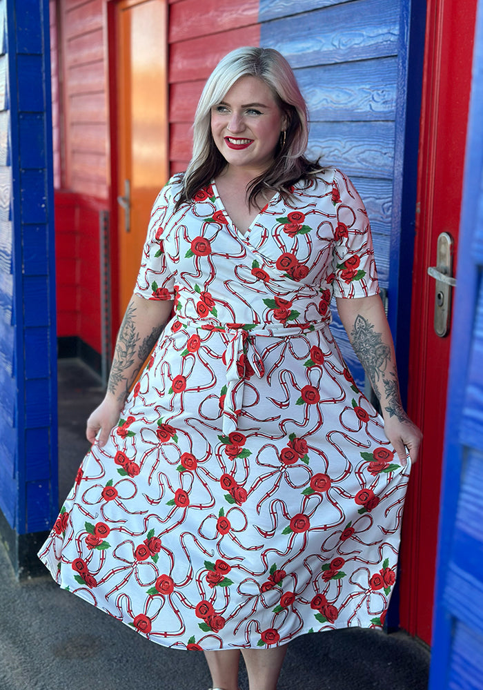 Front view of White England Print Wrap Midi Jersey Dress, a white dress with an English inspired print.