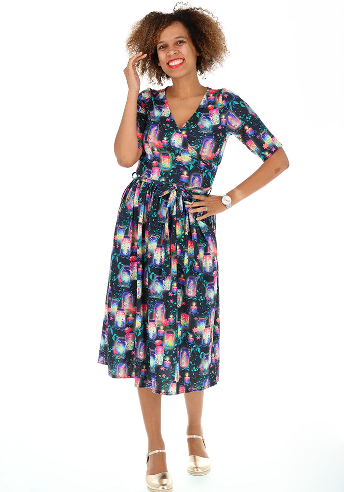 Front view of Nura Illuminated Jars &amp; Candles Print Midi Dress