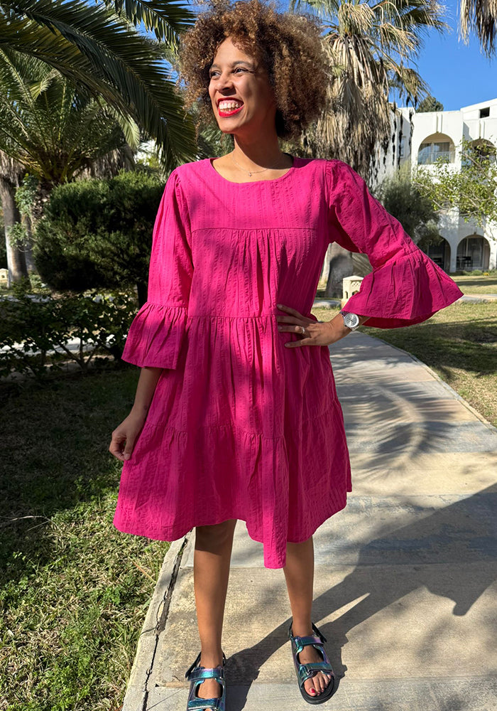 Fourth angle of Mayliss Pink Textured Woven Cotton Tiered Dress