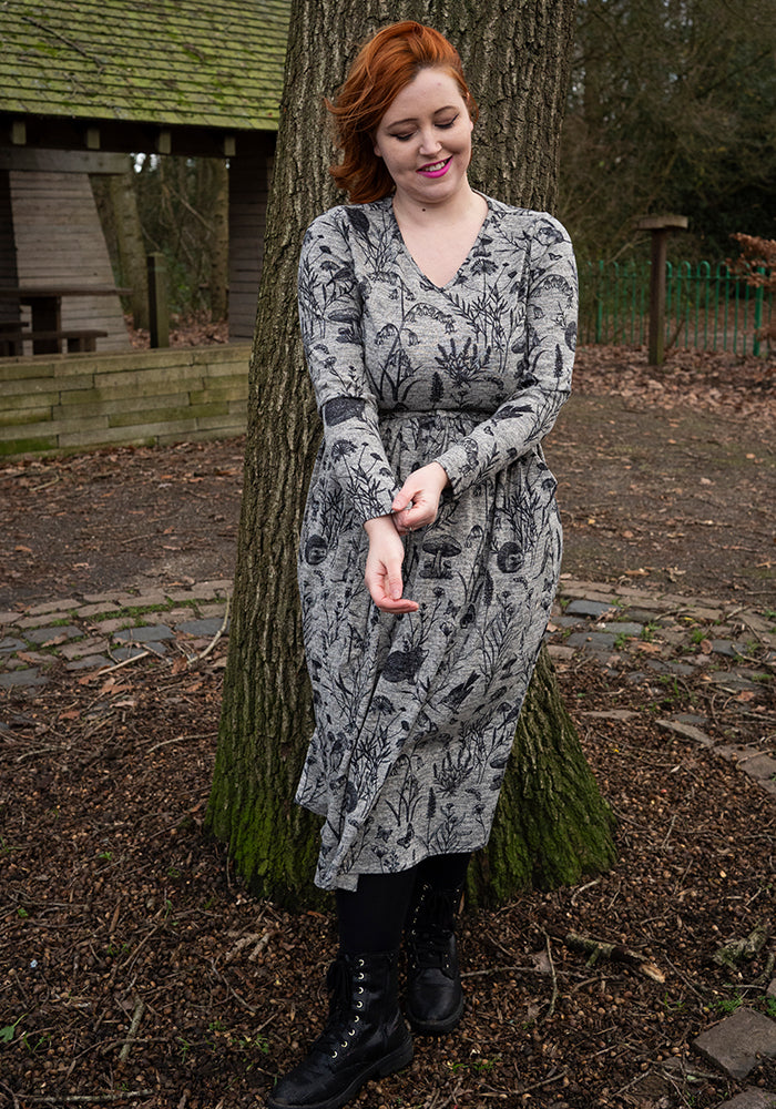 Front view of Netta Wildlife Print Midi Dress