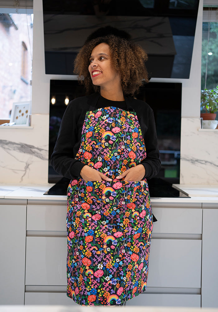 Front view of Garden Rainbow Print Popsy Apron
