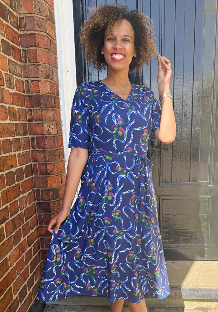 Front view of Navy Scotland Print Wrap Midi Jersey Dress