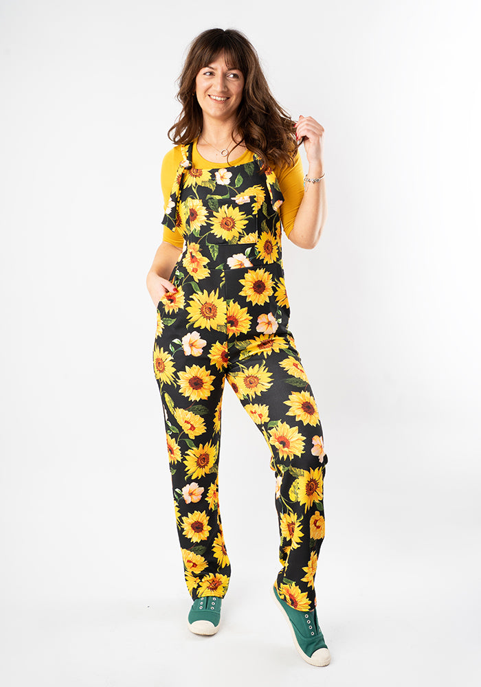 Front view of Jordan Black Sunflower Print Dungaree