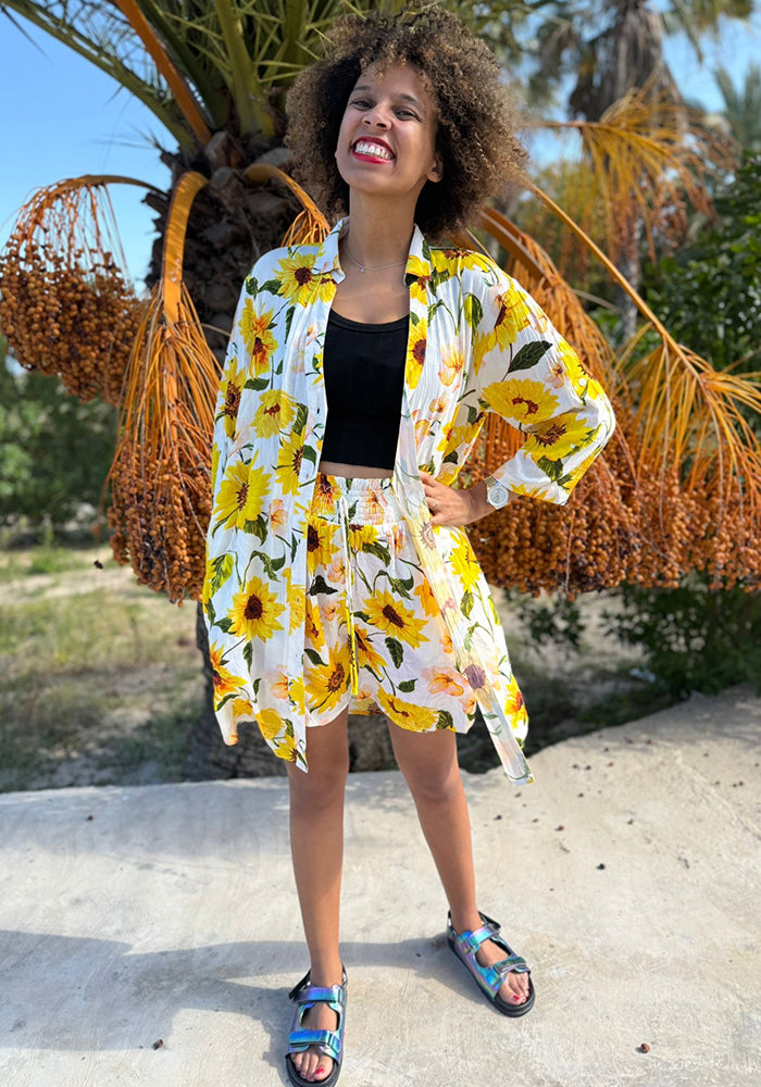 Front view of Zinzi White Sunflower Print Woven Shirt Dress