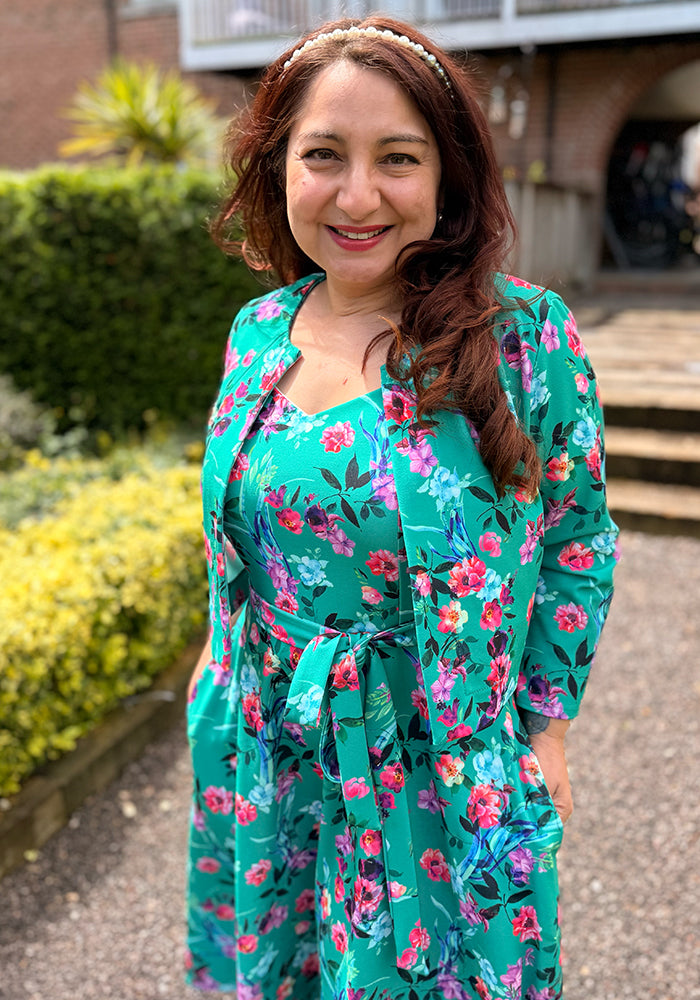 Fourth angle of Rylah Teal Floral Scuba Crepe Bolero Jacket, a bold floral print bolero on our scuba crepe fabric.