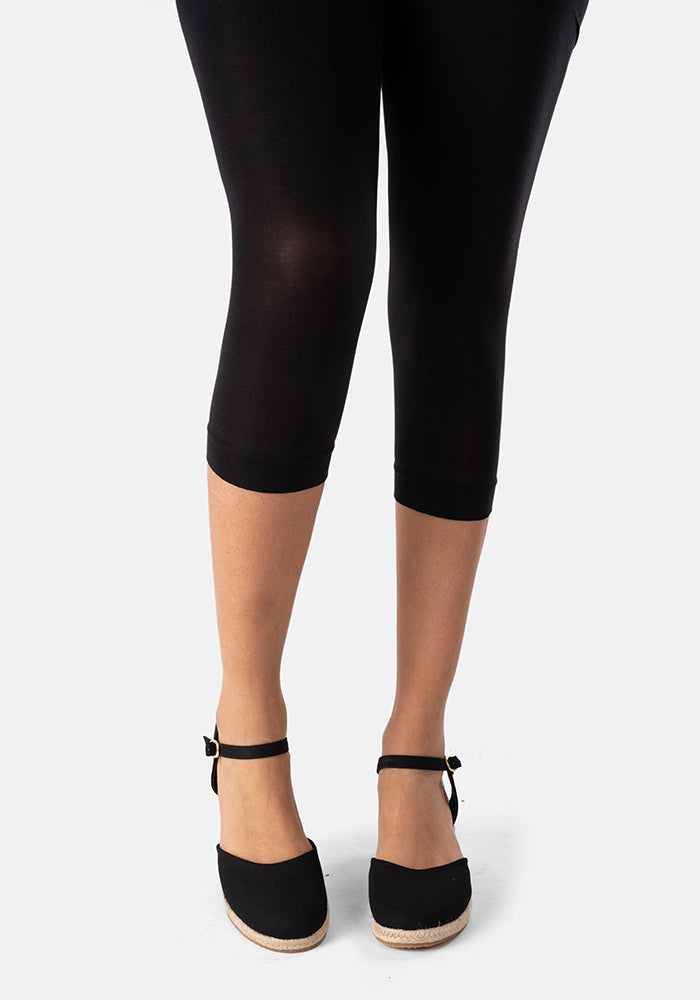 Front view of 50 Denier Premium Capri Tights (Black), complete your outfit with our essential Black 50 denier Capri tights.