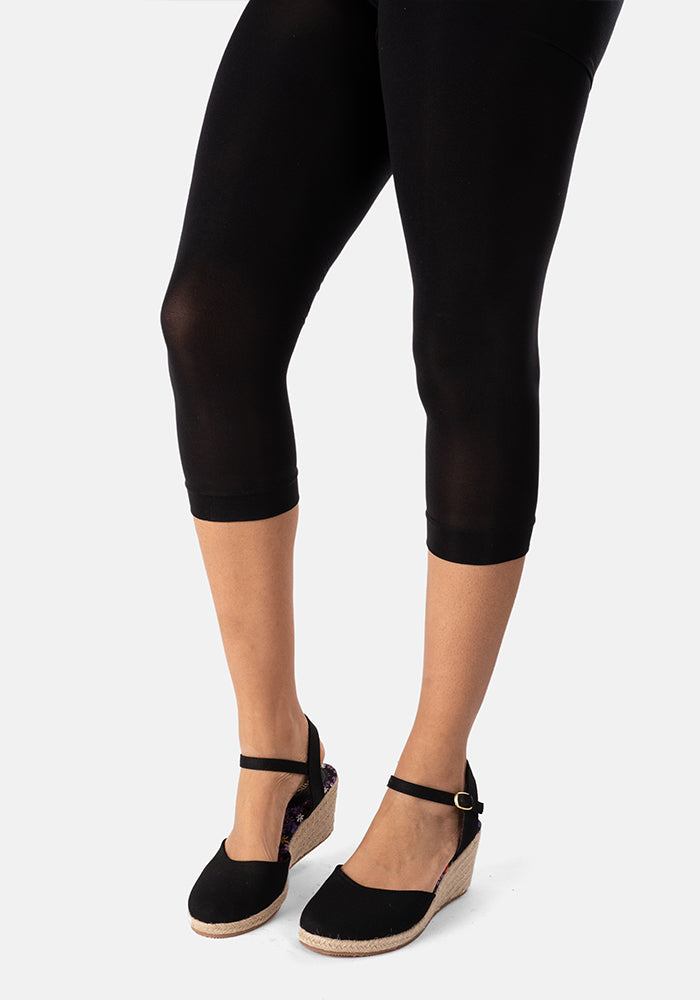 Second angle of 50 Denier Premium Capri Tights (Black), complete your outfit with our essential Black 50 denier Capri tights.