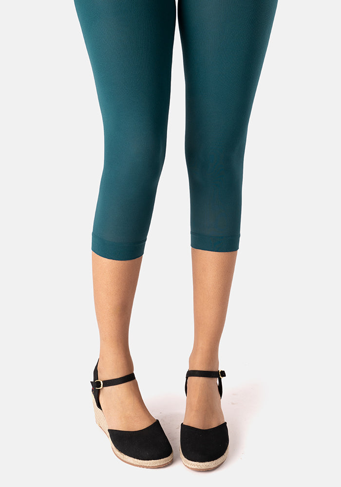 Second angle of 50 Denier Premium Capri Tights (Teal), refresh your wardrobe with our jewel Teal 50 denier Capri tights.